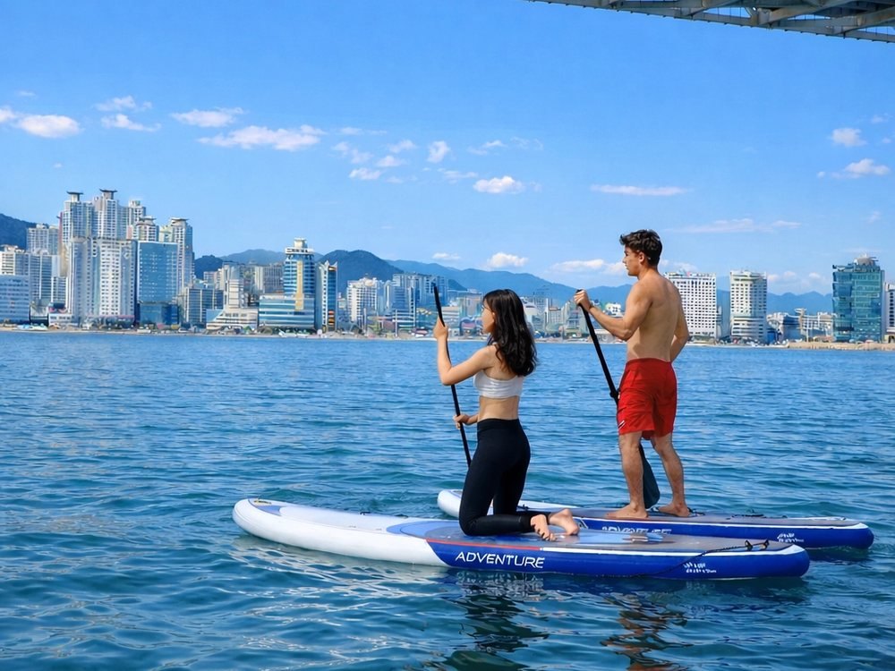 Two people paddleboarding at Gwangalli